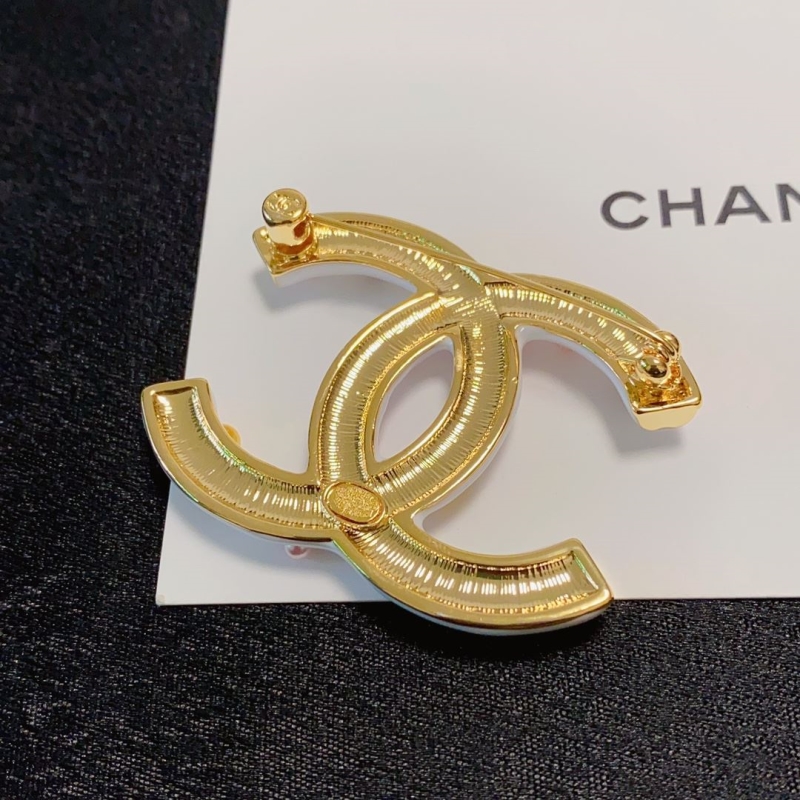 Ch**el brooches